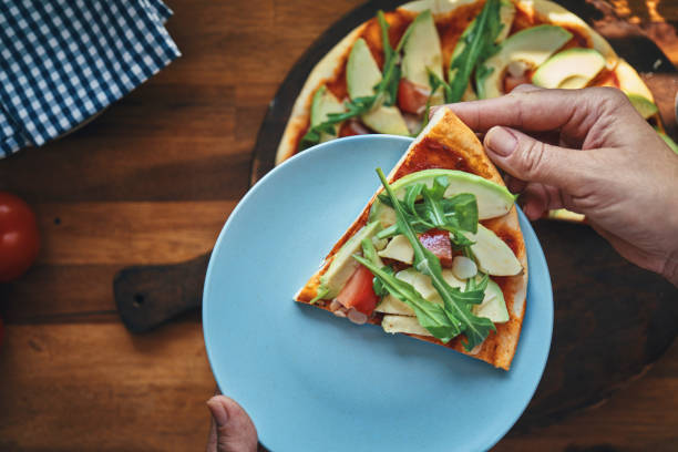 istock Vegan Avocado Pizza with Tomato and Arugula 1271196308