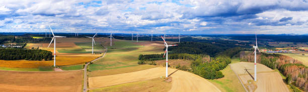 istock some wind wheels in the countryside mid air panorama 1271197020