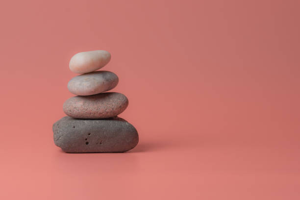 istock Zen stones on a pink background. 1271198089