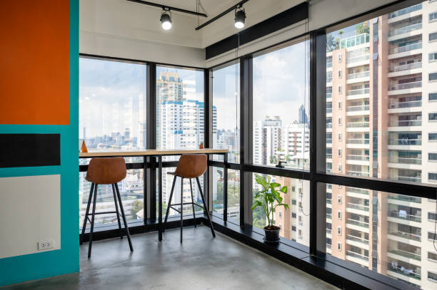 istock Desk with chairs at corner in modern office on business district 1271199248