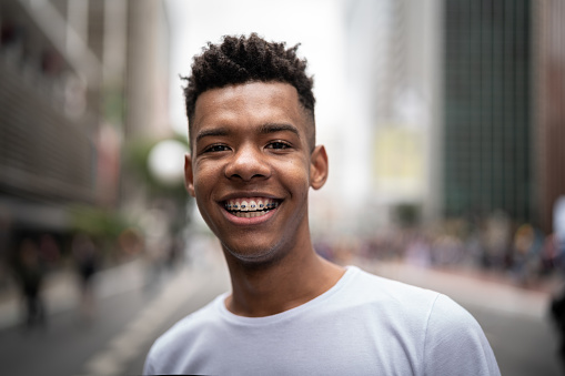 Portrait of a young man in the city