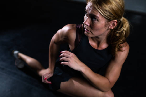 istock A fit blonde woman doing stretching exercises 1271204582