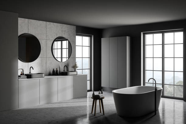 istock Grey bathroom corner, tub and sink 1271204623