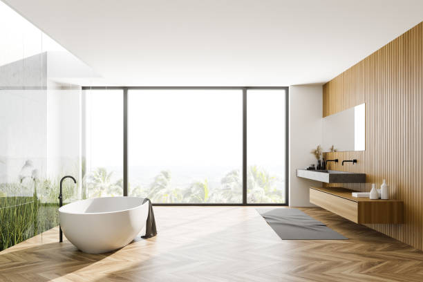 istock Wooden panoramic bathroom with tub and sink 1271204745