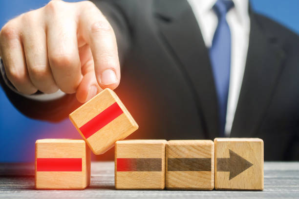 istock A businessman installs a component to improve the work process. Increased efficiency and productivity of work. Innovation and development. Improving the quality of services, implementing new law acts. 1271210061