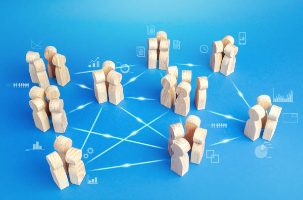 istock Many related teams in the company do the work in cooperation. Coordination and knowledge sharing. Business model of autonomous groups without middle managers. Self-organization structure innovation 1271210062