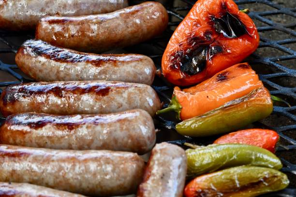 istock Brats and Peppers on the Grill 1271215006