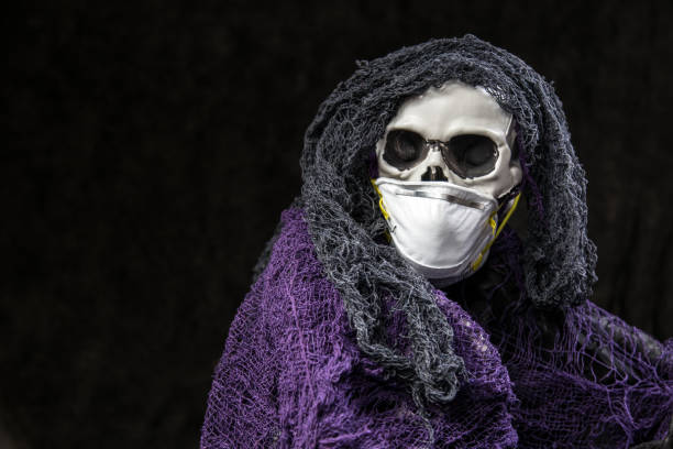 istock Skeleton Wearing a N95 Protective Face Mask 1271215902