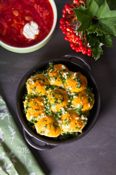 istock Buns Pampushky - Ukrainian garlic bread. Bread rolls with garlic and parsley 1271215982