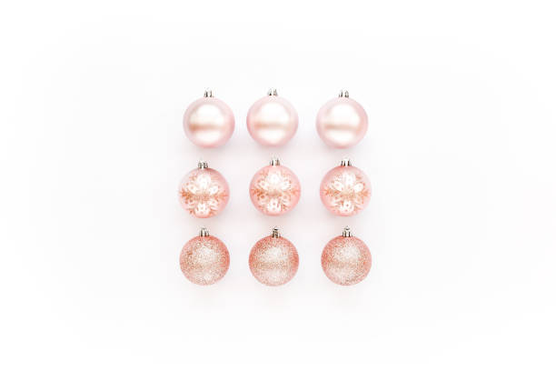 istock Christmas decoration: pink glass christmas balls on white background. flat lay, top view 1271216121