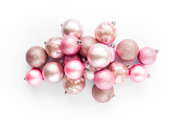 istock Christmas decoration: pink glass christmas balls on white background. flat lay, top view 1271218675
