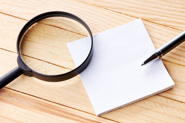 istock office workplace with blank sticky note. above view. wooden desk. background backdrop 1271219649