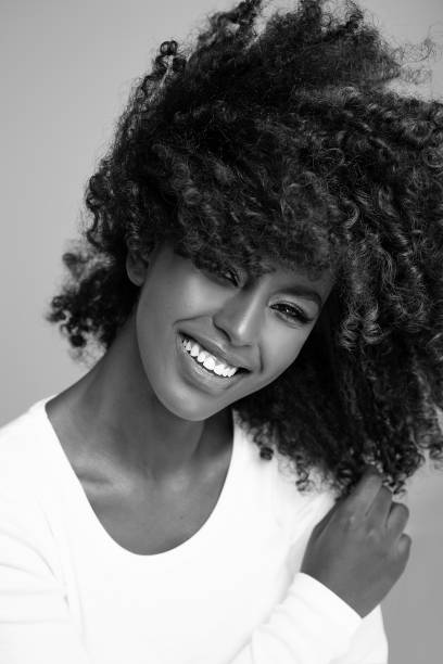 istock Happy african american woman smiling. 1271221904