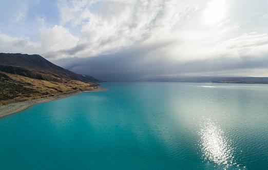 Overhead view of Lake Pukaki, with storm brewing in Mt Cook, National Park, South Island, New Zealand.