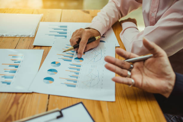 istock Business Corporate team brainstorming with chart and checking and analysis 1271237287