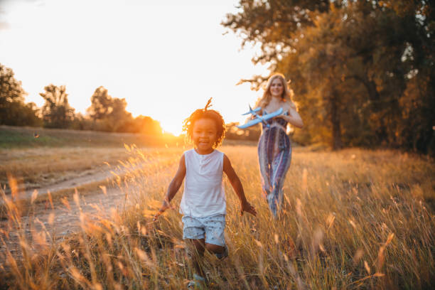 istock Mother and son having fun outdoors 1271241995
