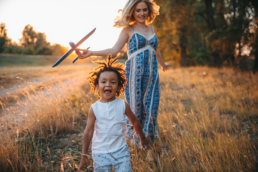 Mother and son having fun outdoors