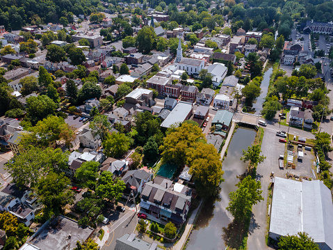 Scenic seasonal landscape from above aerial view of a small town countryside of Lambertville New Jersey USA in the historic city New Hope Pennsylvania US.