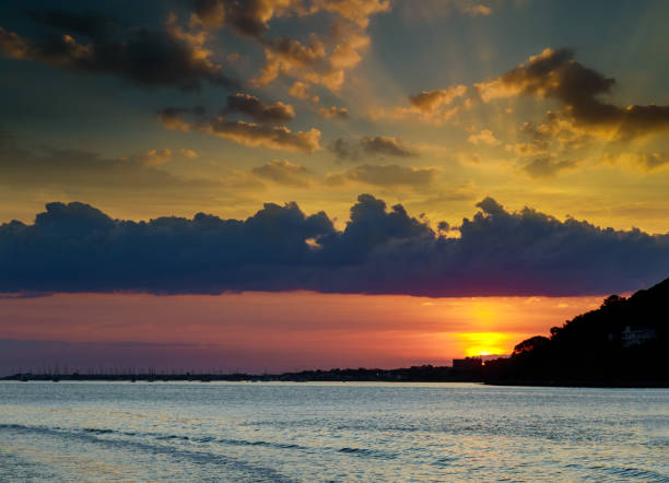 istock Amazing sunset with endless colorful horizon ocean 1271245110