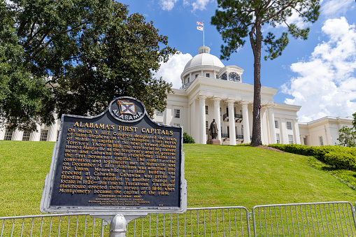 Montgomery, AL / USA - August 27, 2020: Alabama's First Capitals historical marker near the State Capitol Building in Montgomery, Alabama