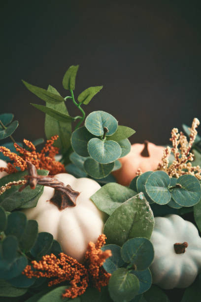 istock Thanksgiving background with pumpkins and leaves 1271246033