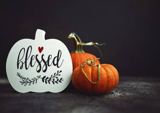 istock Thanksgiving Fall Background with Pumpkins and Holiday Message Reading Blessed 1271246125