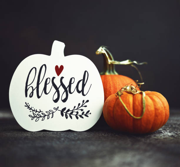 istock Thanksgiving Fall Background with Pumpkins and Holiday Message Reading Blessed 1271246126
