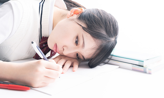 Studying asian school girl.