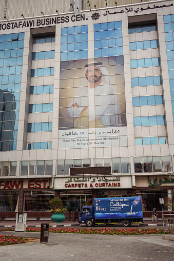 Dubai / United Arab Emirates - February 1, 2020: Photo of Sheikh Mohammed Bin Rashid 50 years of devotion in high building in the street of Dubai