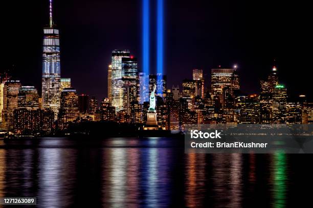 911 Memorial Beams With Statue Of Liberty And Lower Manhattan Stock Photo - Download Image Now