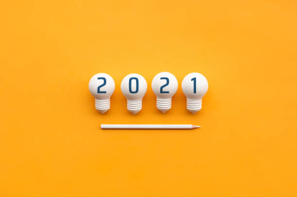 2021 Creativity and nspiration ideas concepts with lightbulb and pencil on color background