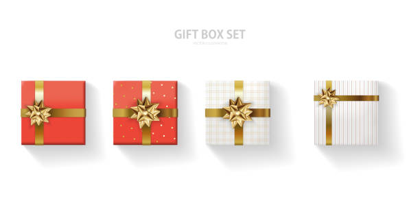 Set of gift box with a gold bow on a white background. Realistic top view. Vector illustration EPS10 Set of gift box with a gold bow on a white background. Realistic top view. Vector illustration EPS10 bow hair bow ribbon gold stock illustrations