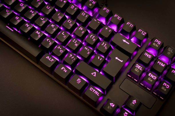 istock Black gaming keyboard with backlight. Close up. Selective focus. 1271269386