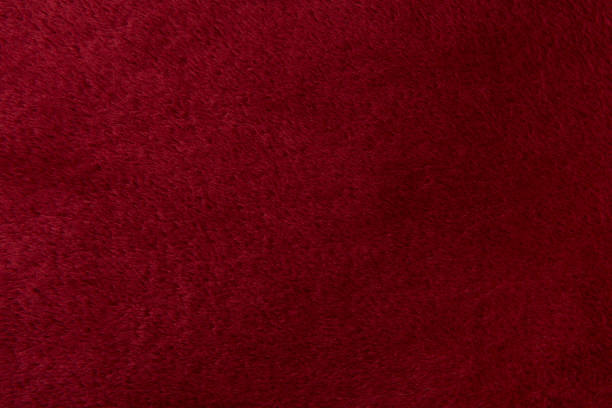 istock Full-frame burgundy red velvet cloth background 1271273122