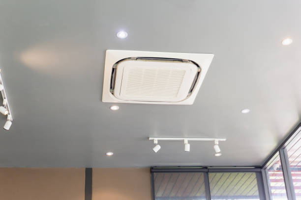 istock Modern ceiling mounted cassette type air conditioning system in coffee shop 1271274522