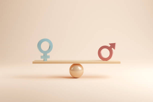 concepto de igualdad de género. símbolo masculino y femenino en las escalas con equilibrio sobre fondo azul. estilo minimalista. - símbolo de género fotografías e imágenes de stock