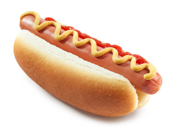 Hot dog with mustard isolated on white background Hot dog with mustard and ketchup isolated on white background hot dog photos stock pictures, royalty-free photos & images