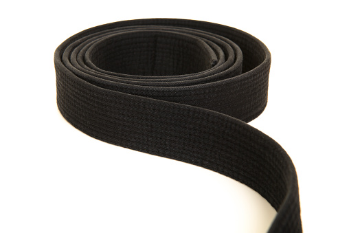 Martial art black belt on a white background