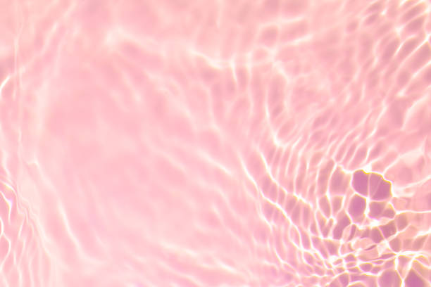 istock pink transparent clear water surface texture summer background 1271275353