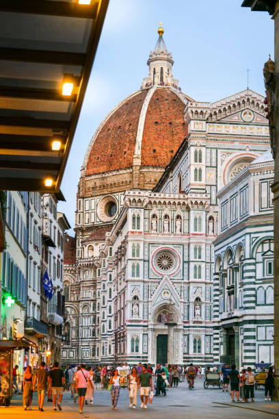a late afternoon view of the cathedral of santa maria del fiore in florence - rose window florence italy cathedral tuscany imagens e fotografias de stock
