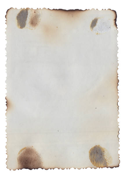 istock Old vintage texture retro paper with burned edges, stains and scratches background 1271276971