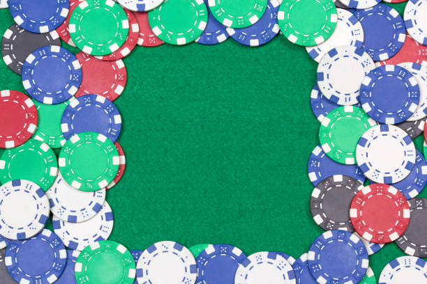 istock frame with colorful poker chips on the green table 1271277195