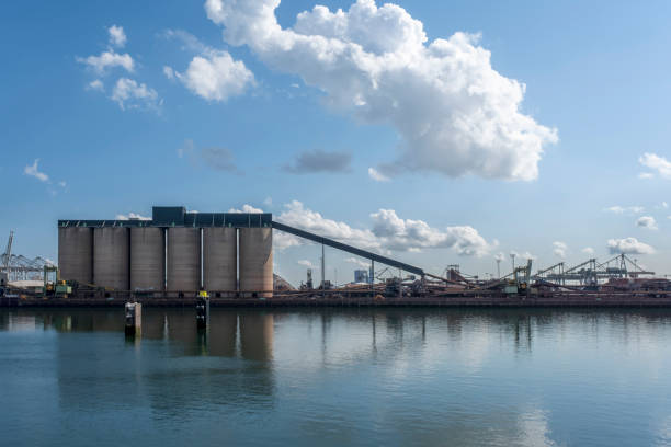 istock Type of cargo terminal and cranes, berths for transshipment of bulk cargo, iron ore and coal 1271281422