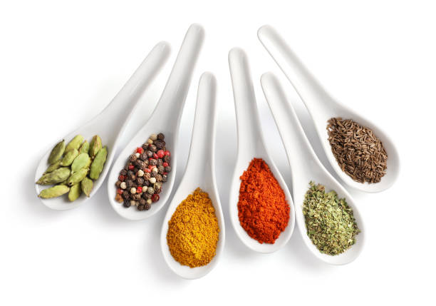 istock Top view of various spices in spoons isolated on white background. 1271284008