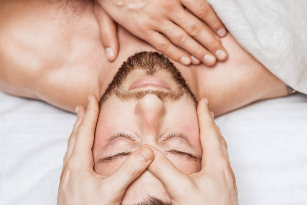 istock Young caucasian man enjoying head massage 1271284019