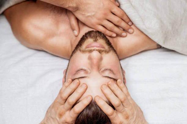 istock Man receiving relaxing head massage. 1271284039