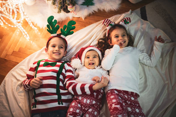 istock Happy children on Christmas Eve 1271288653