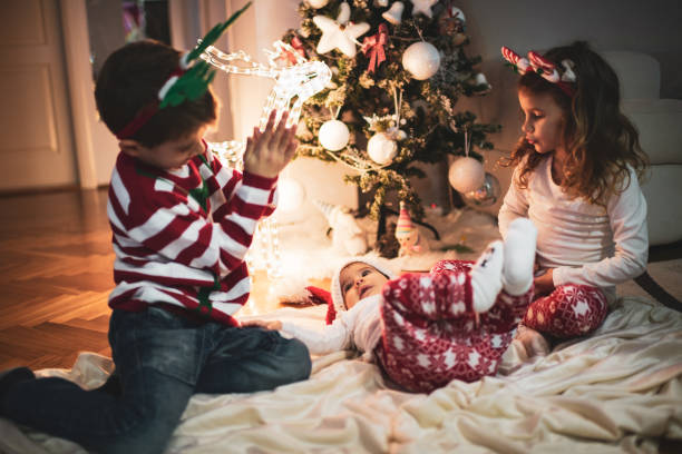 istock Happy children on Christmas Eve 1271288785
