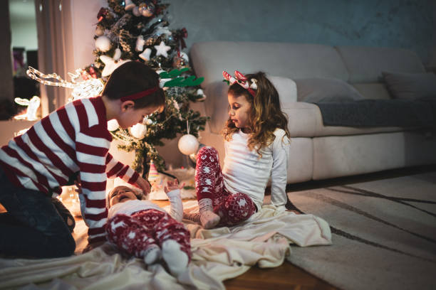 istock Happy children on Christmas Eve 1271289042