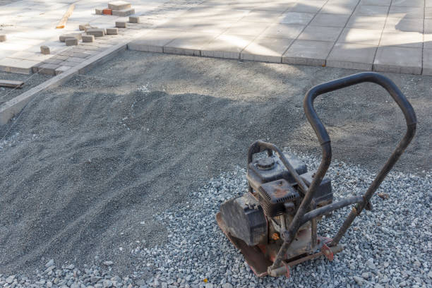 istock Manual ramming machine for compacting soil at a construction site. Equipment for construction work. Hand tool. 1271289085